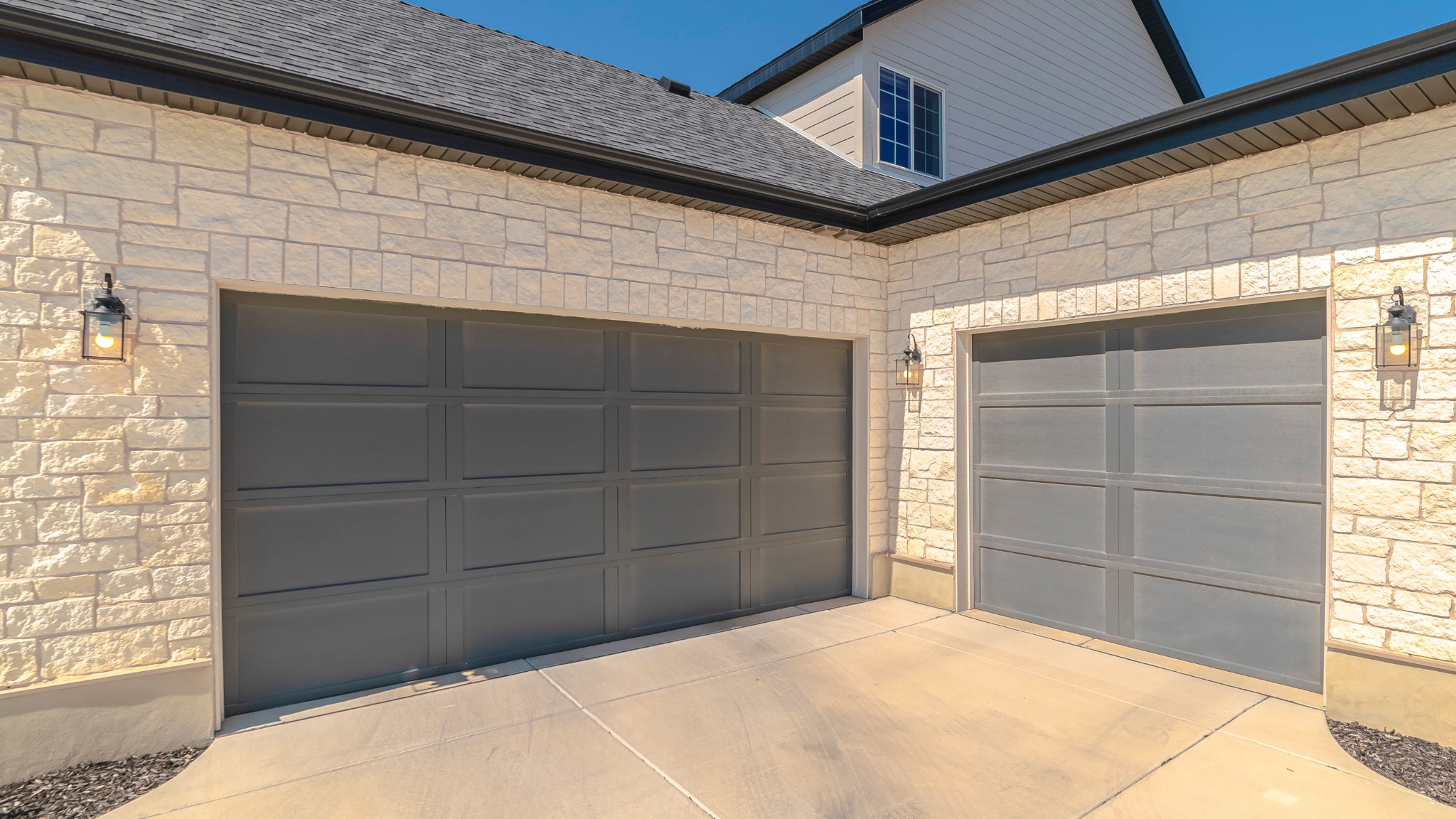 Modern dark garage doors for a Lawton home
